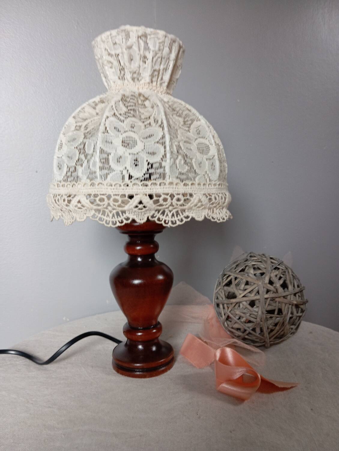 Table lamp with romantic wood and lace ambiance, retro chic