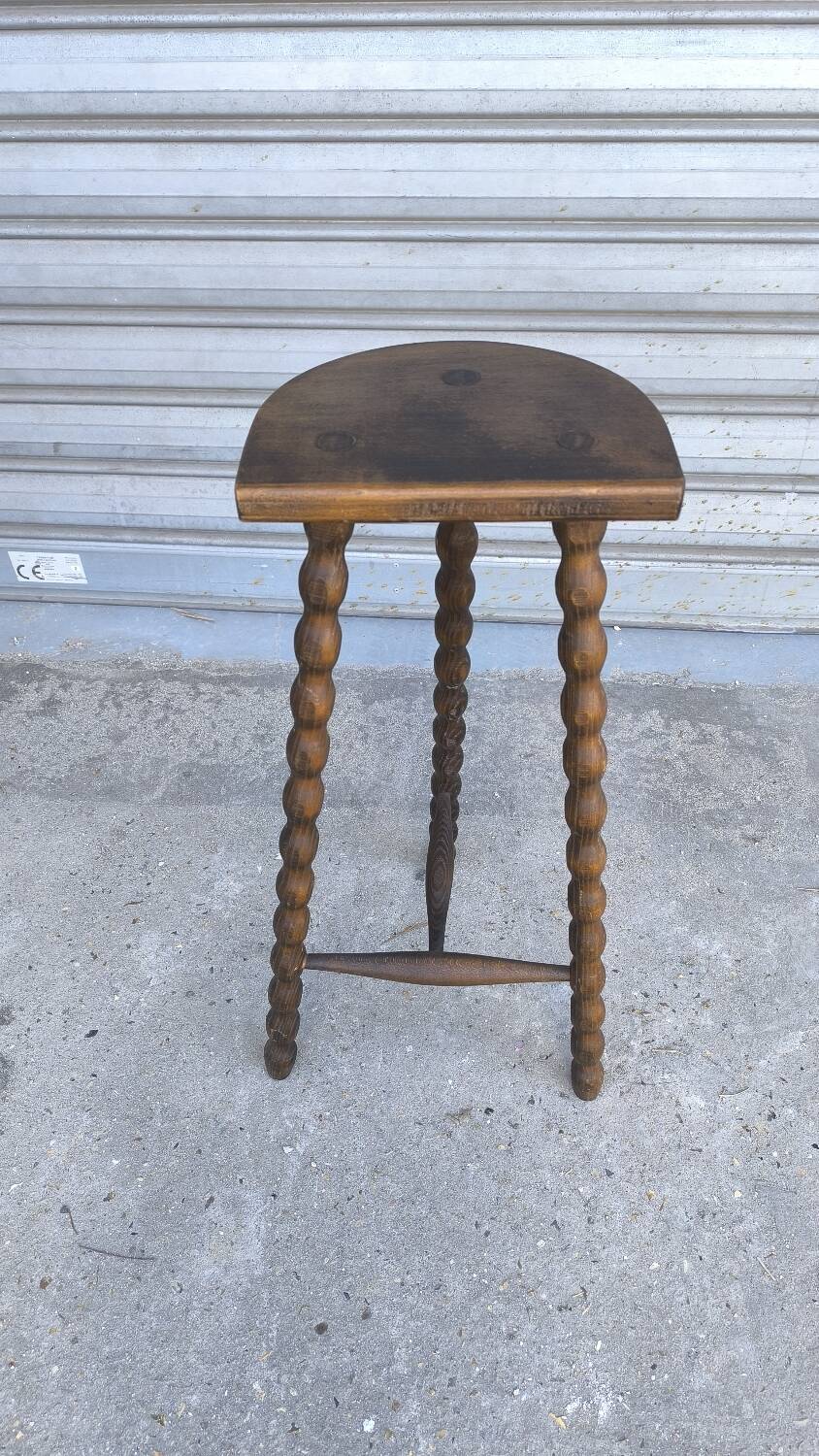 Turned wooden tripod stool