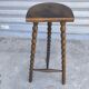 Turned wooden tripod stool