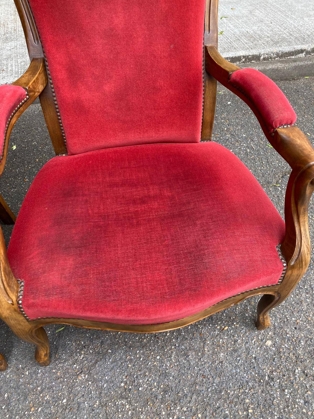 2 Louis Philippe cabriolet armchairs in burgundy velvet wood from the 19th century.