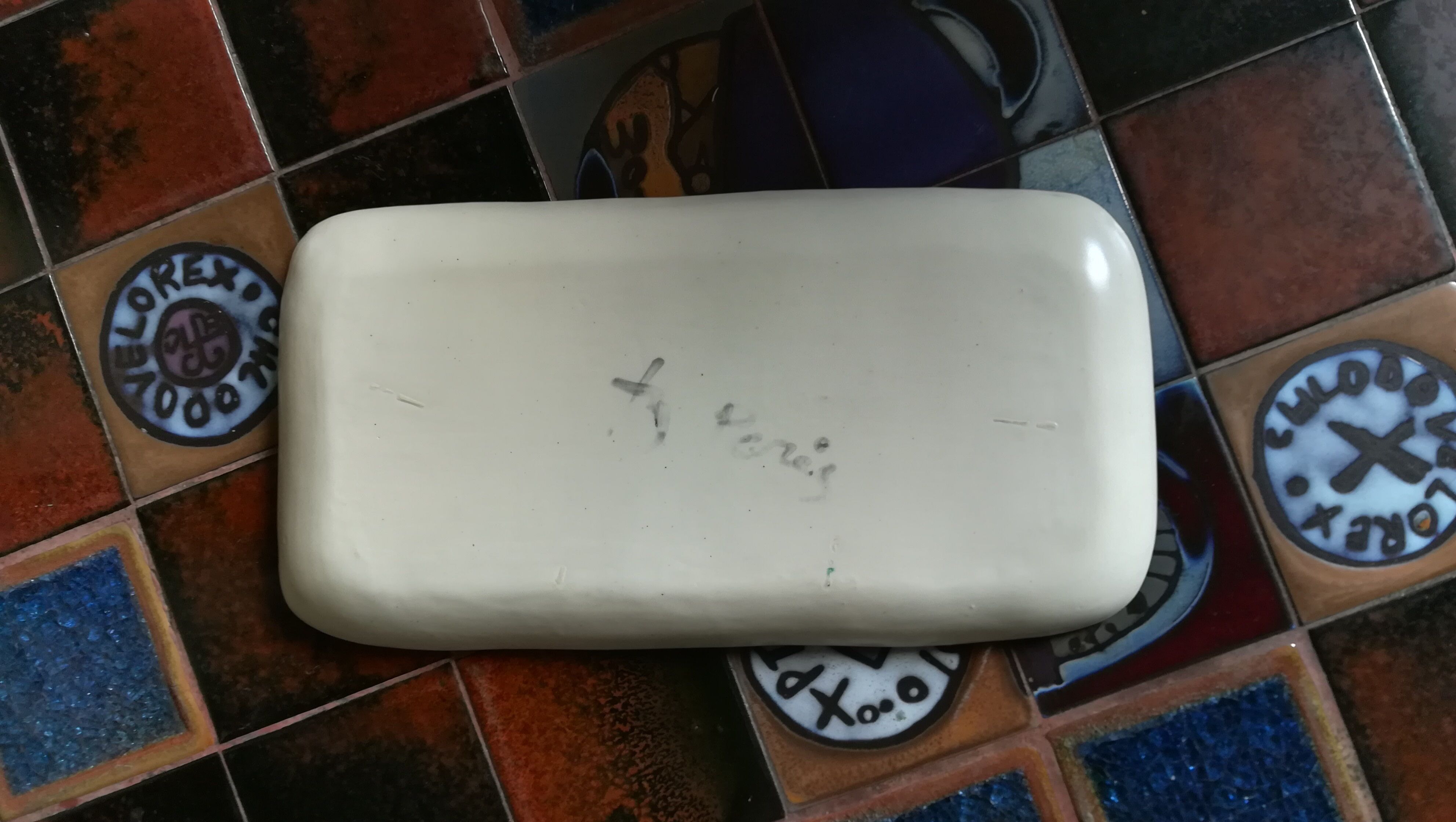 Empty ceramic pocket, circa 1950, signed.