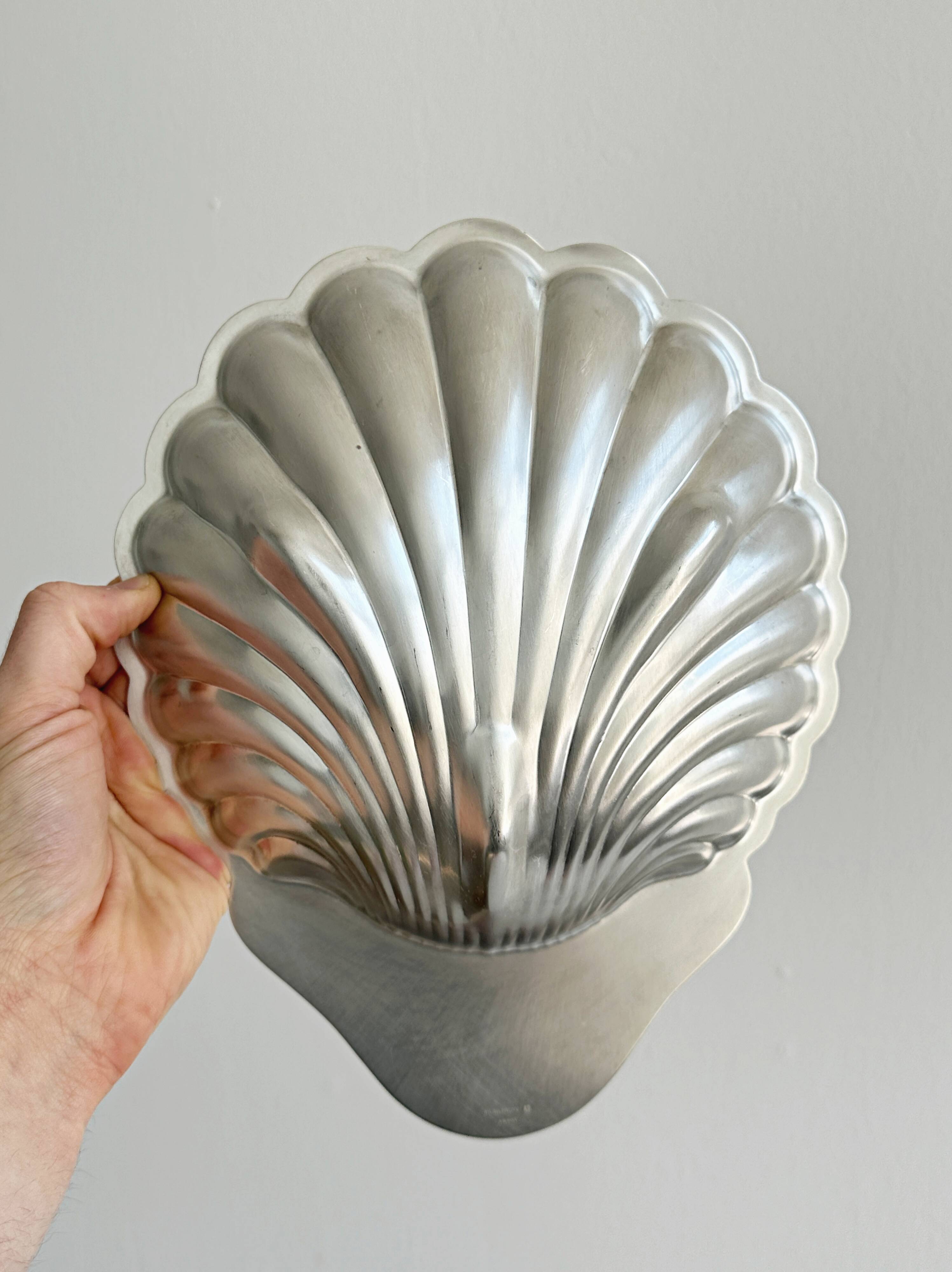 Metal shell plate