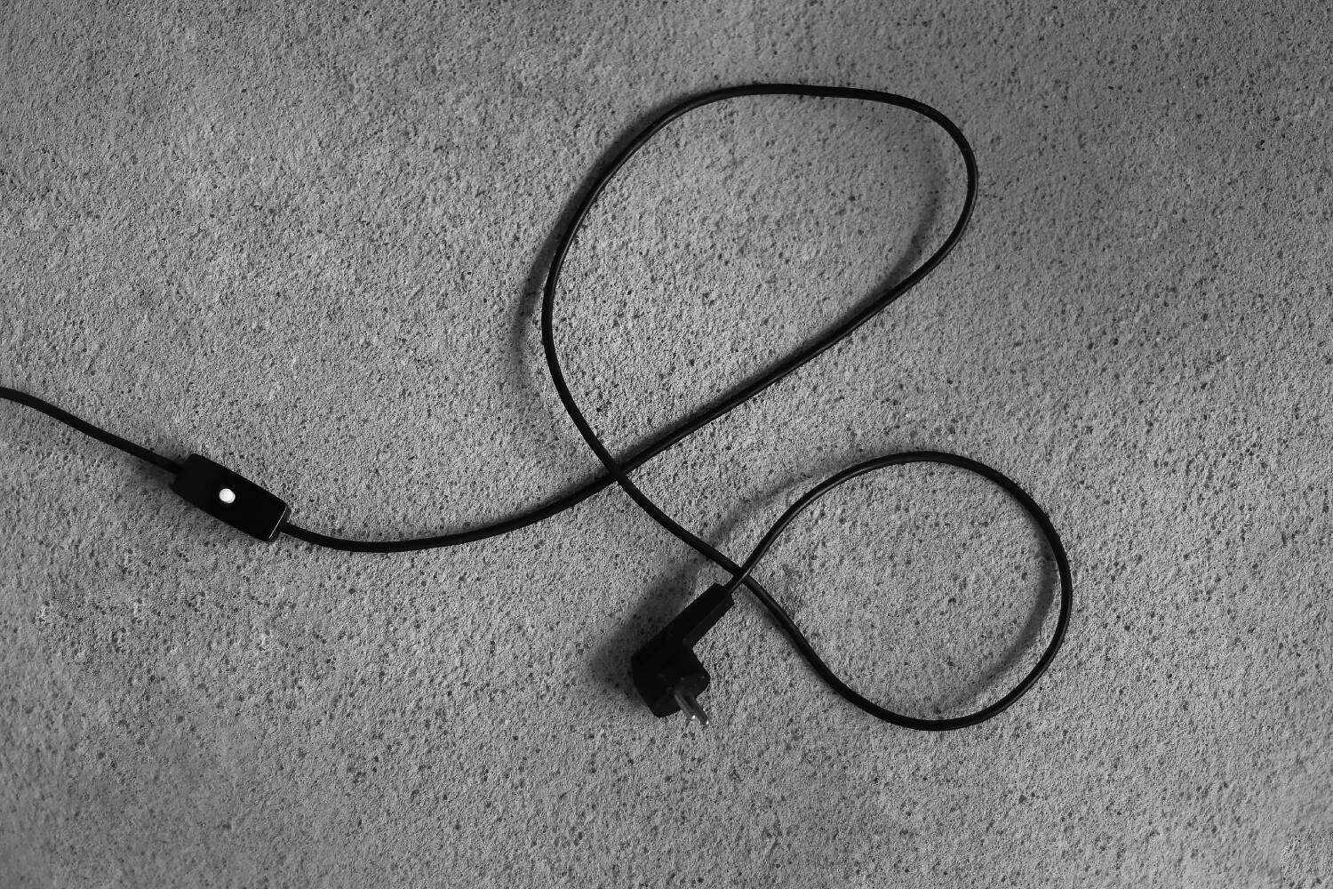 Small modern Polish table lamp from the mid-century with a black shade, 1960s.