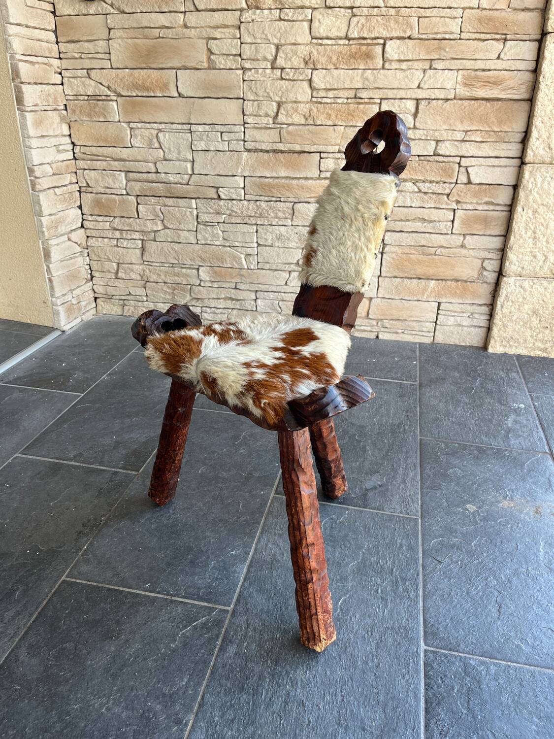 Vintage brutalist tripod chair in wood and leather