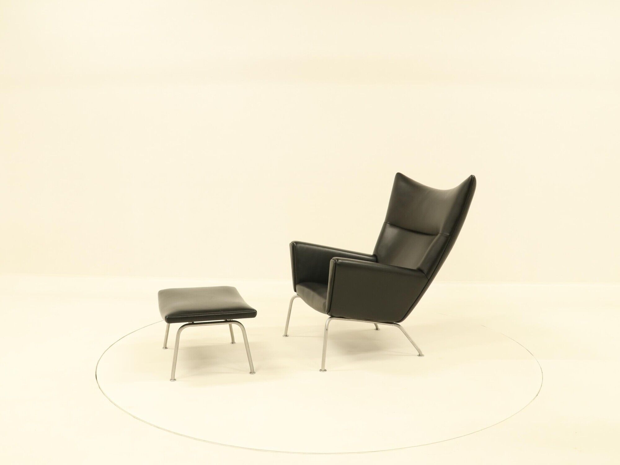 Wing chair & matching ottoman – CH445 & CH446 – by Hans Wegner