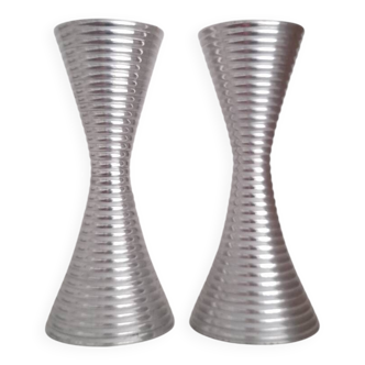Pair of fluted aluminum candlesticks