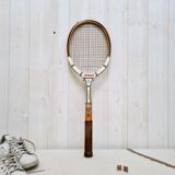 Vintage tennis racket with wooden press
