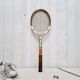 Vintage tennis racket with wooden press