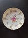 Small bowl / pierced plate in painted Nymphenburg porcelain.