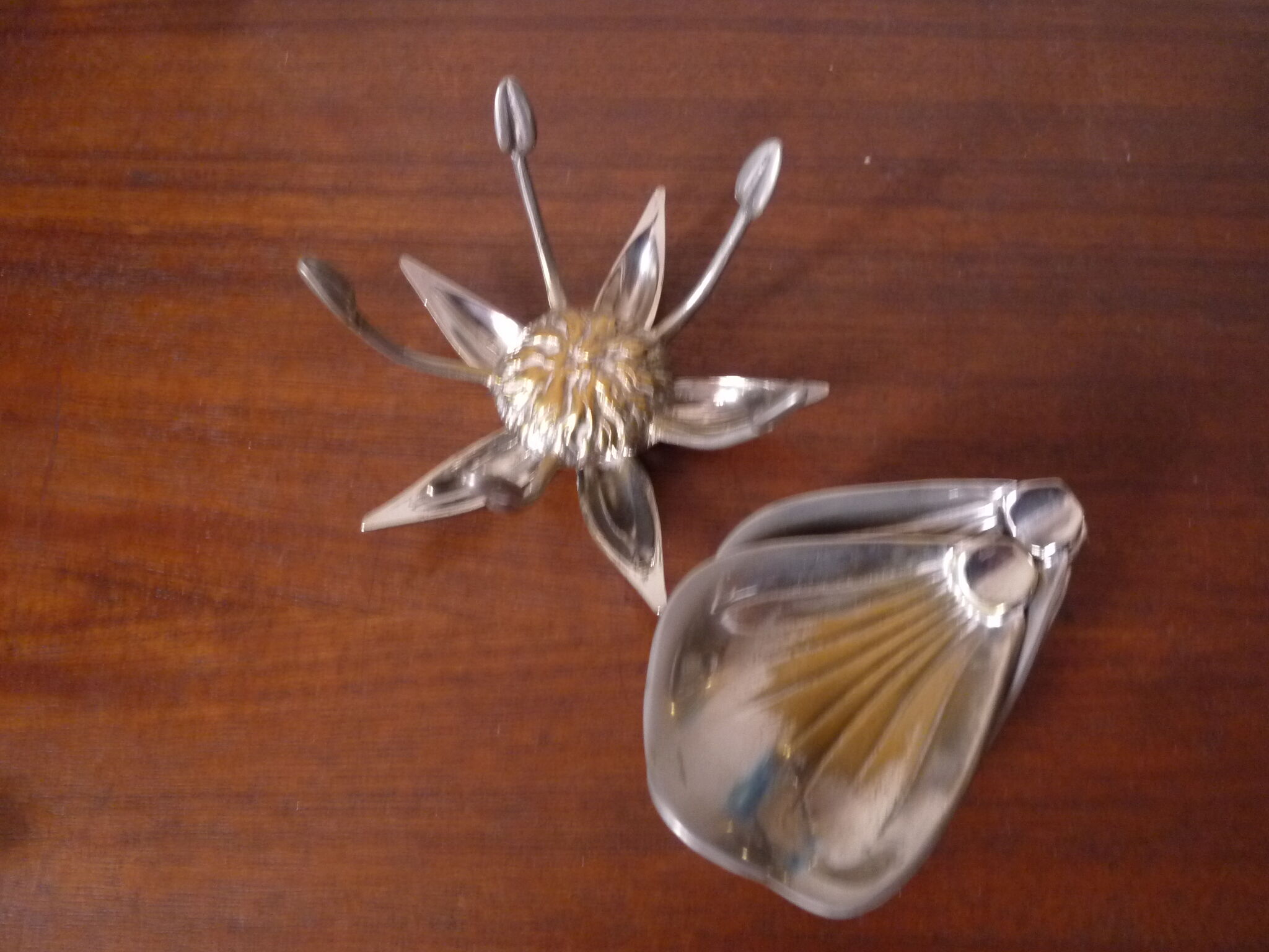 Individual ashtrays on decorative metal flower