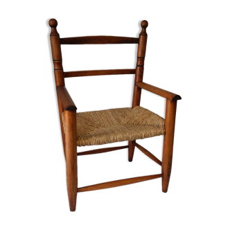 Wooden children's and ancient straw armchair