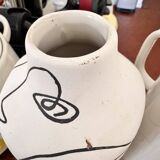 “One line” face vase