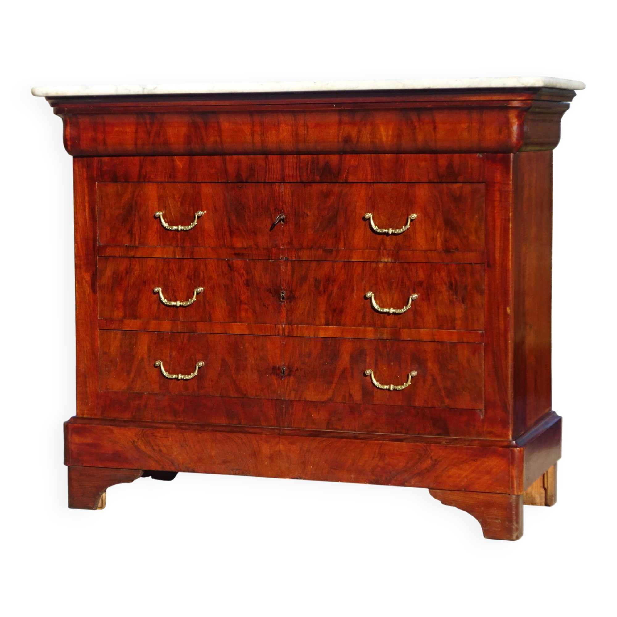 Antique mahogany chest of drawers with white marble.