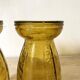 Paire de vases à jacinthe en verre ambré bullé