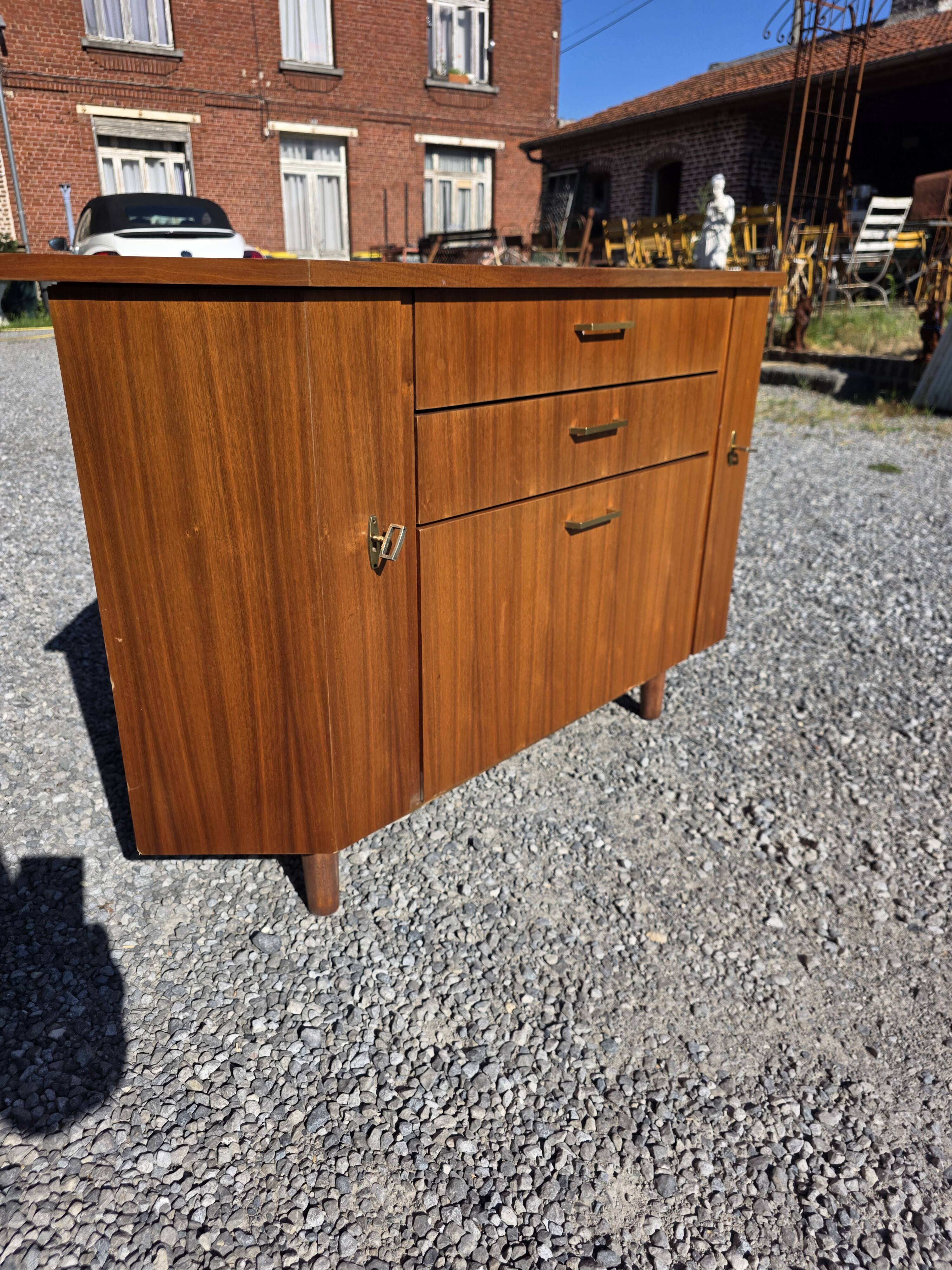 Scandinavian corner unit in teak from the 1960s.