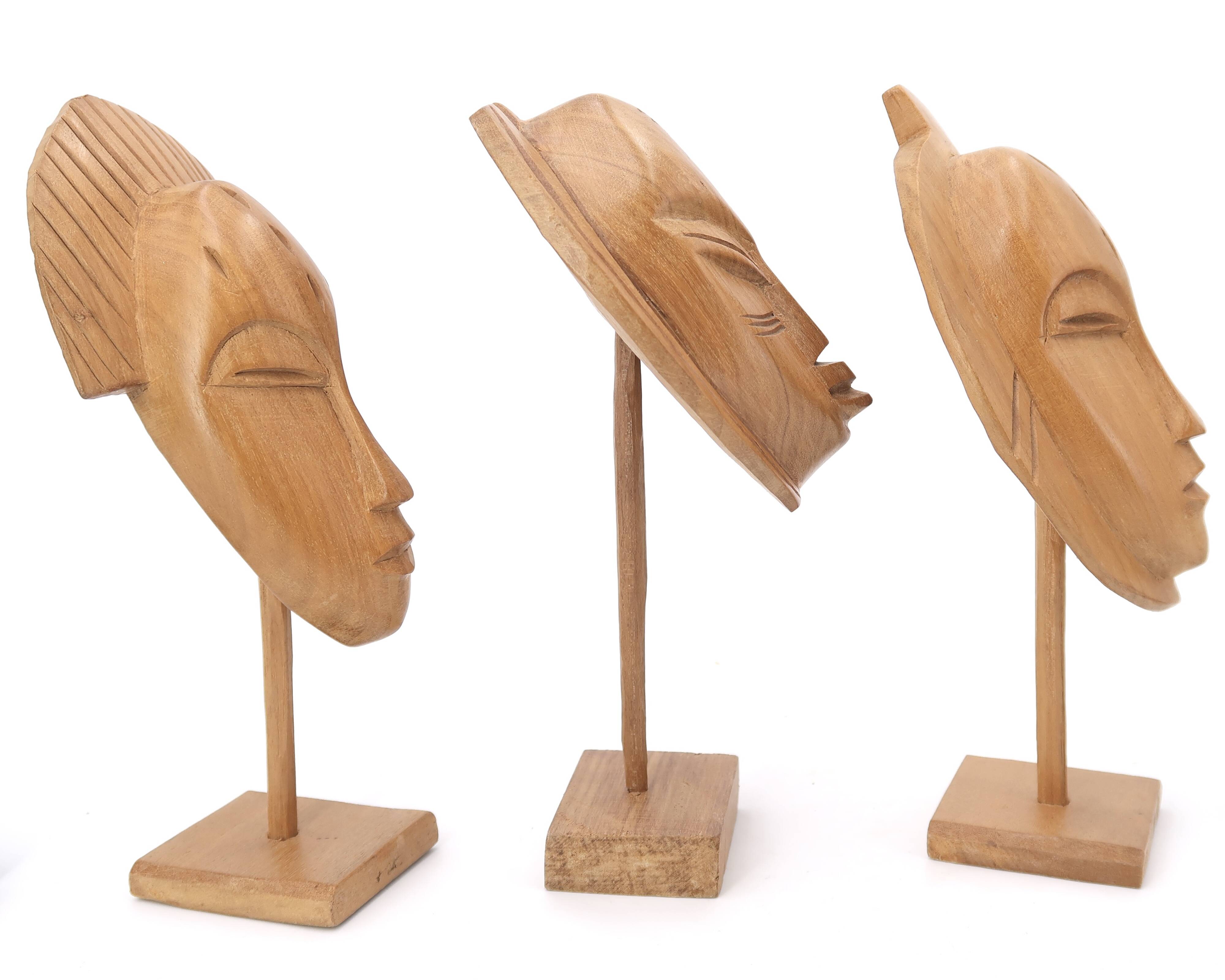 Six African masks with wooden bases, 1970s