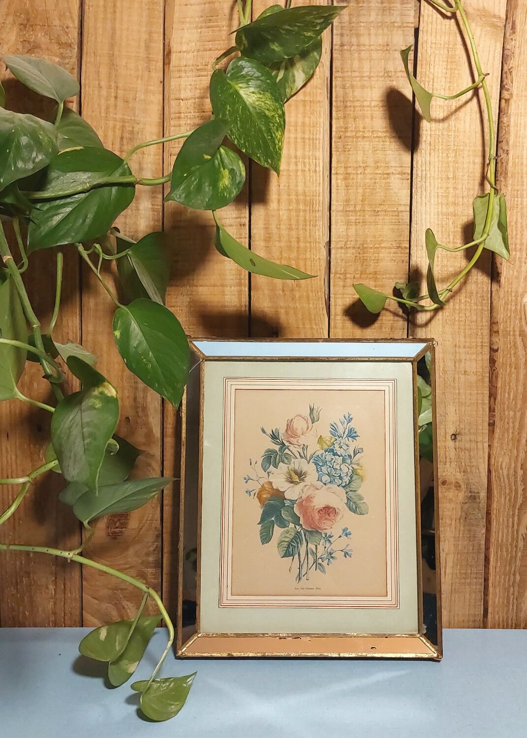 Flower print and period mirror frame