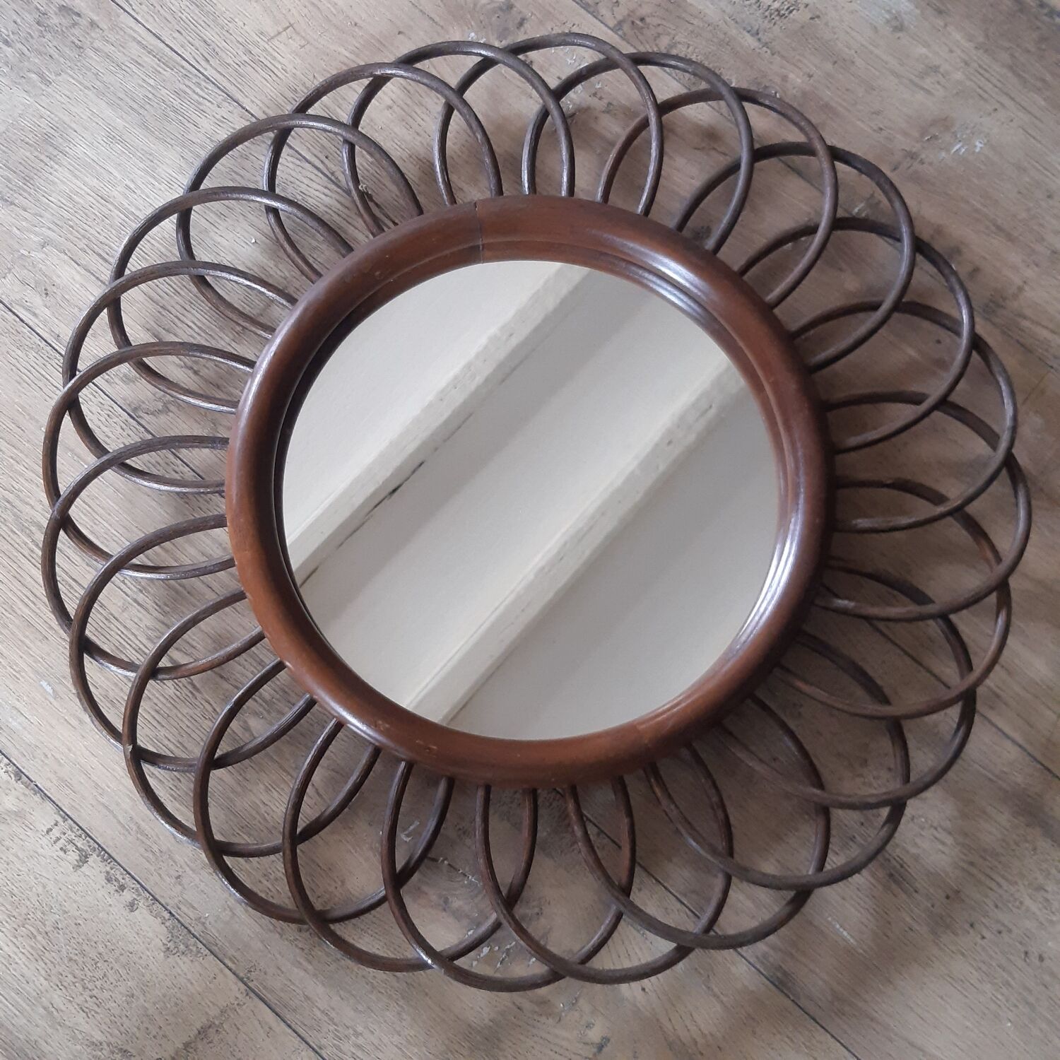 Vintage rattan sun mirror
