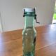 Vintage glass bottle l'Idéale with porcelain stopper
