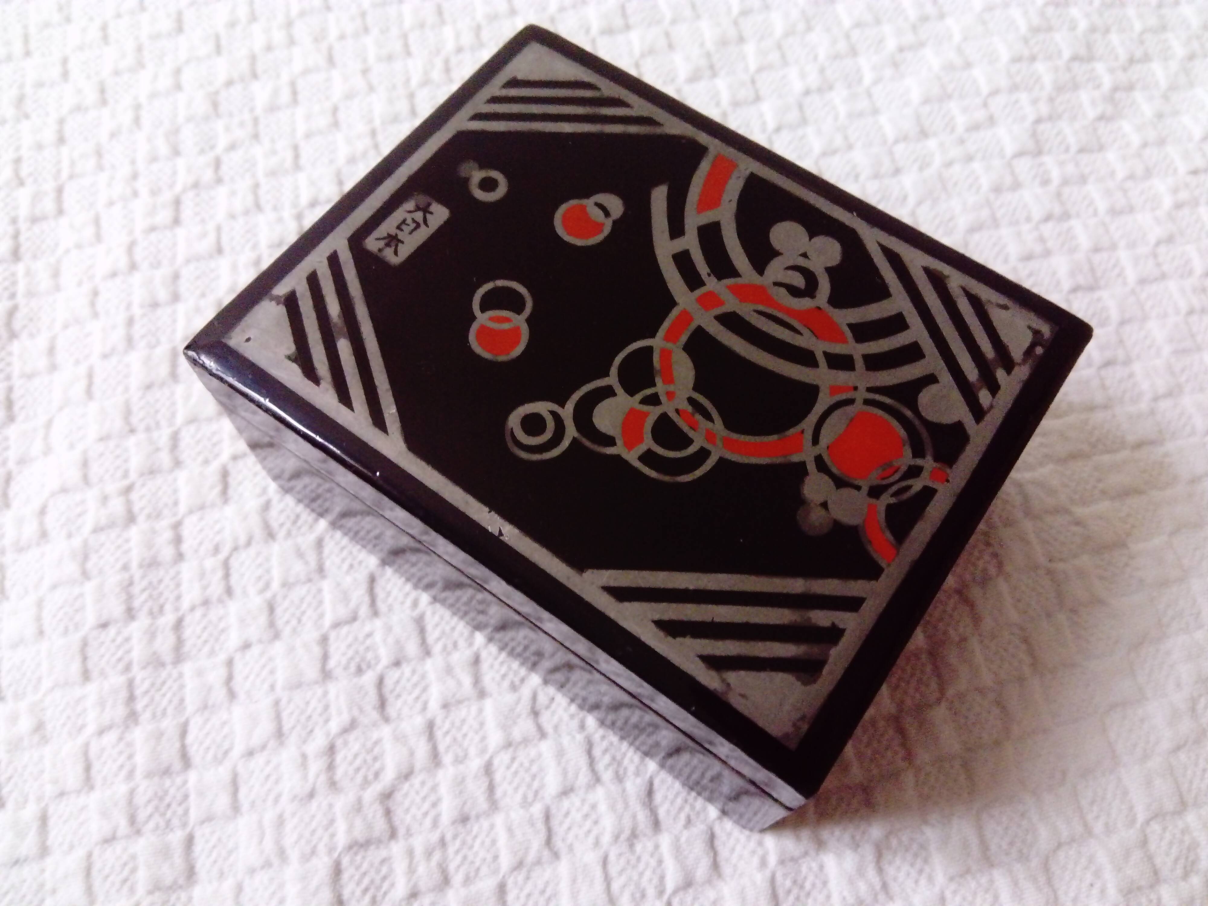 Small black lacquered box with Art Deco decor.Japan