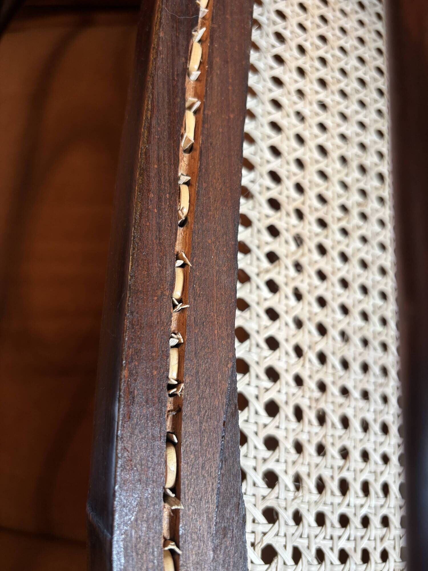 Antique Thonet bench in bent wood and caning, signed.