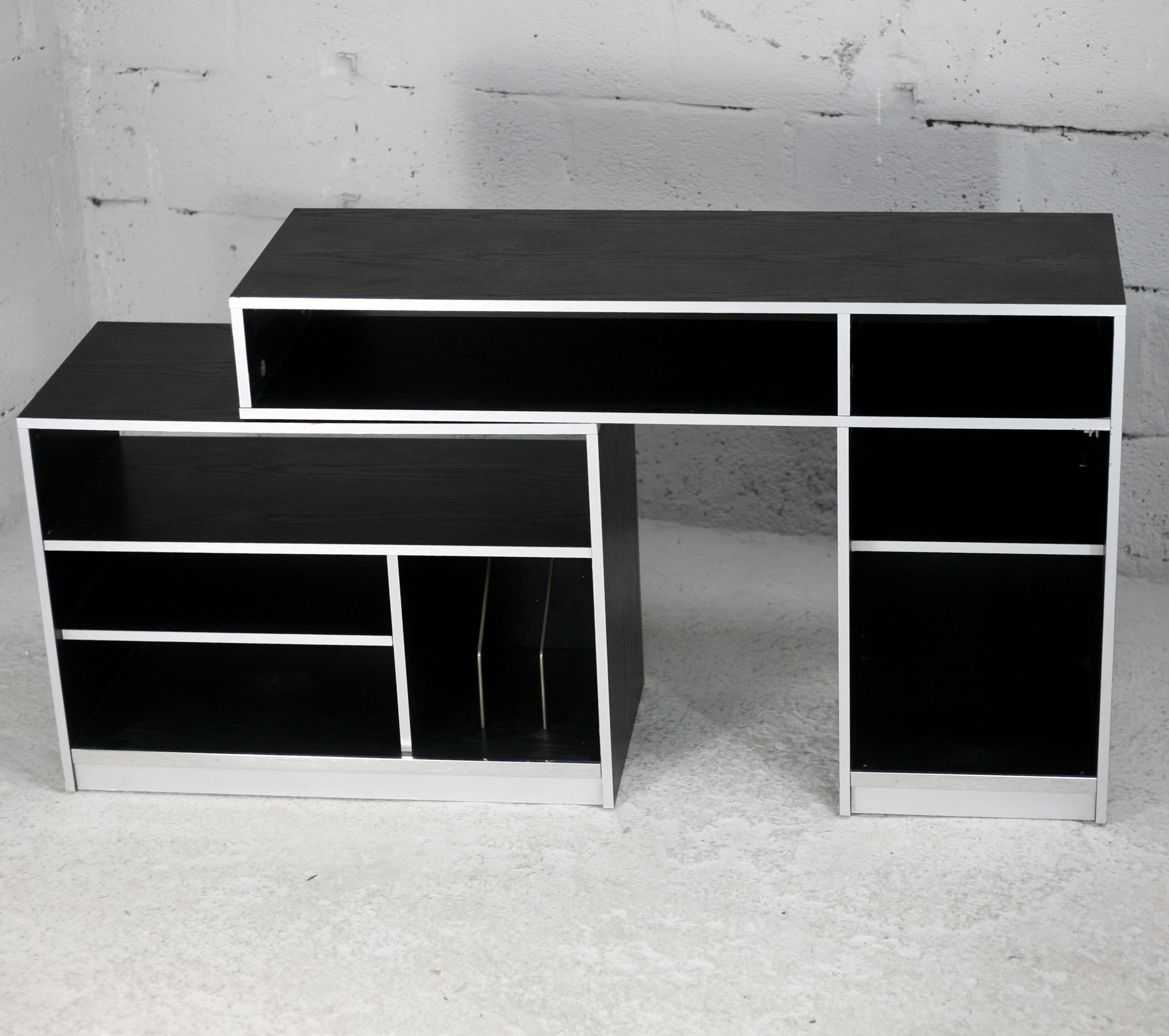 Storage cabinet wood compressed lacquered black lining margins aluminum. France, circa 1975.