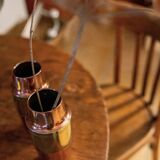Copper vase forms a shaker