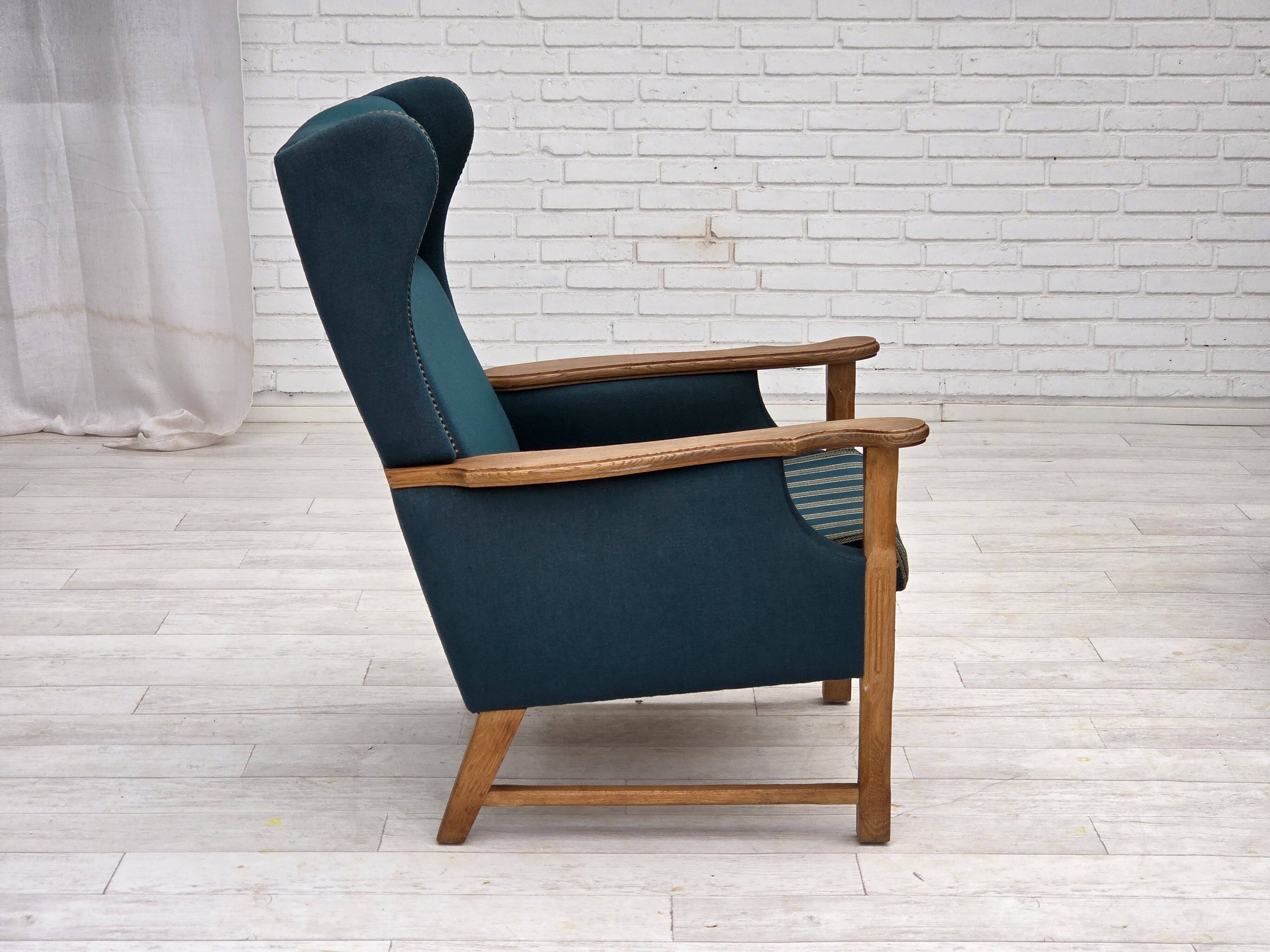 1970s, Danish highback armchair, furniture wool, solid oak wood.