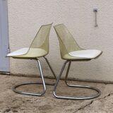 Pair of 70's smoked plexiglass and chrome chairs