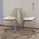 Pair of smoked plexiglass and chrome chairs from the 70s.