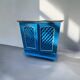 Large colonial style wooden cabinet with latticework
