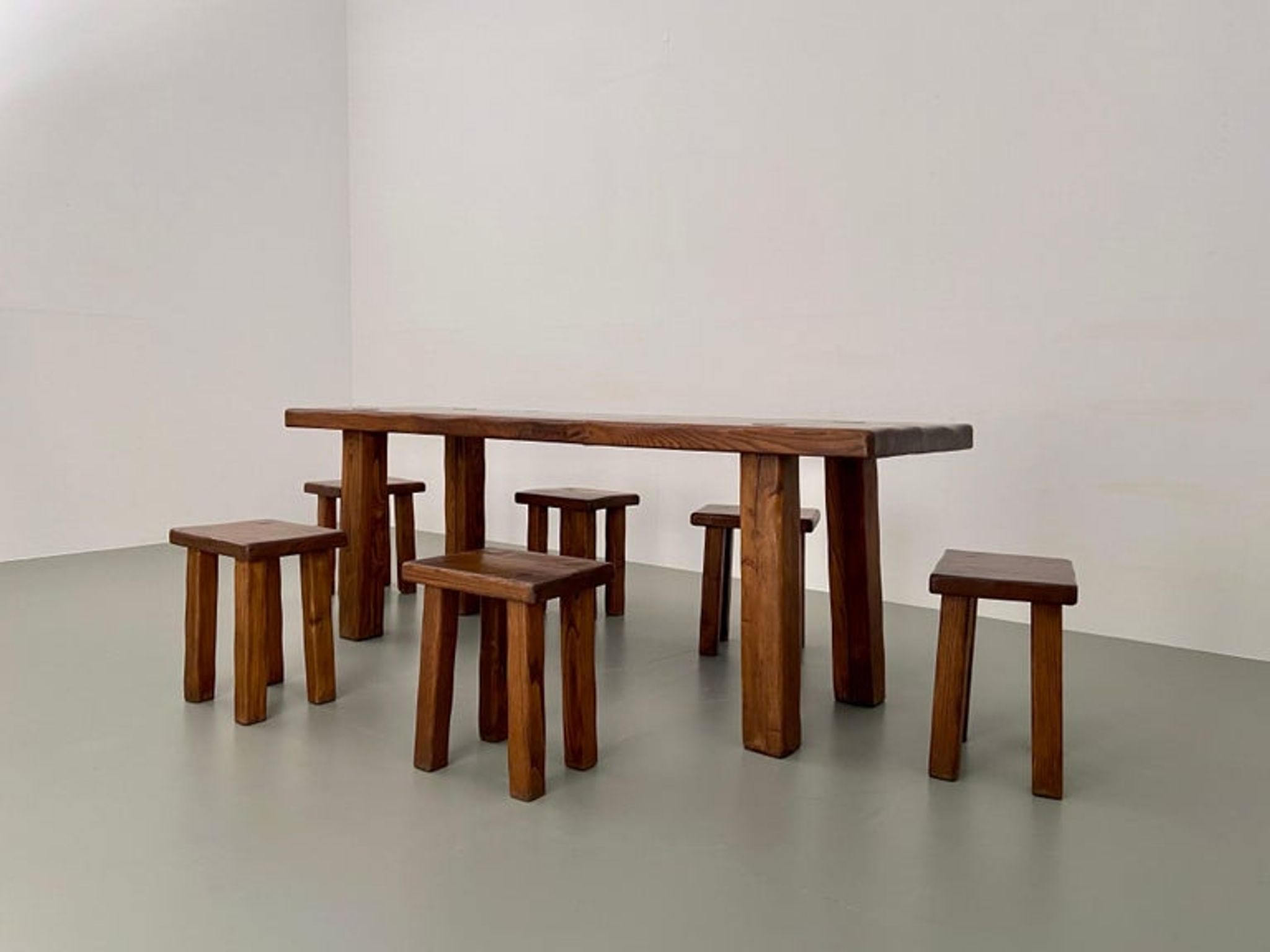 Solid elm dining set including 6 stools France 1970s