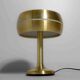 Italian brass table desk lamp with sculptural base and glowing band, 1960s