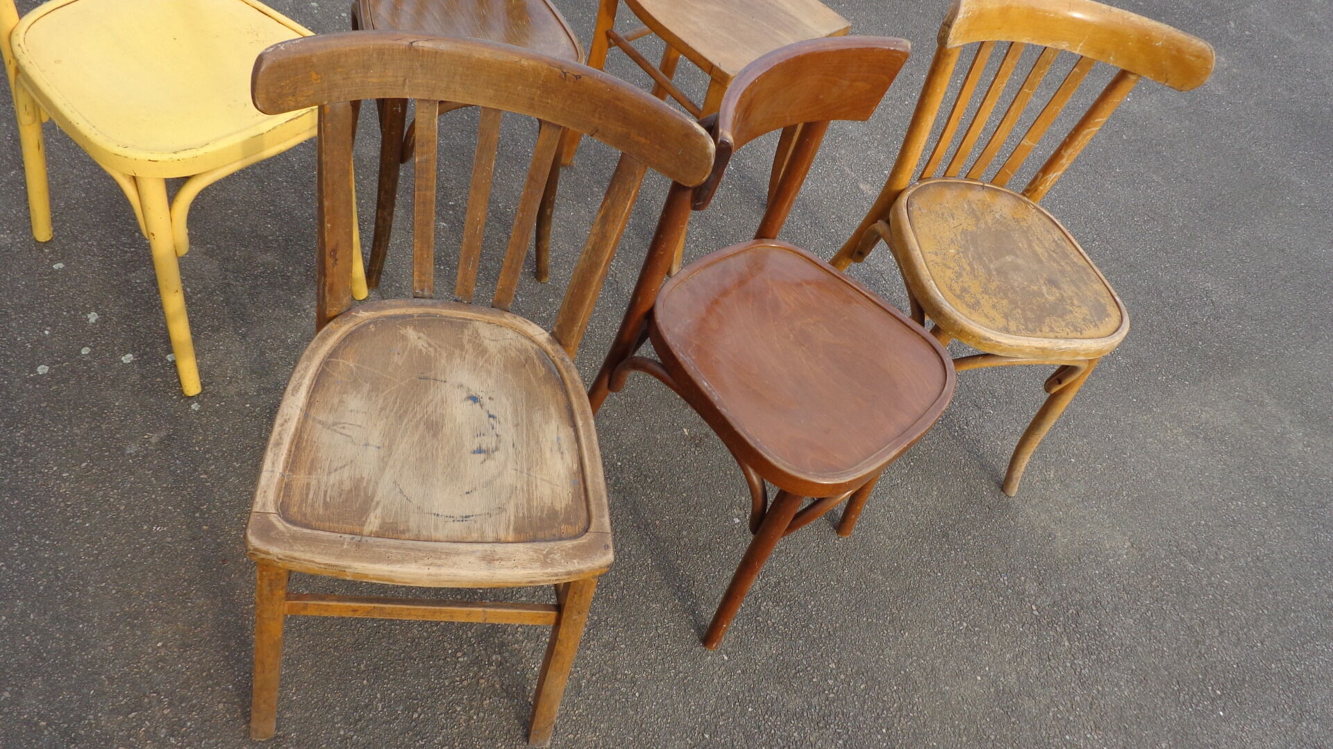 6 mismatched bistro chairs