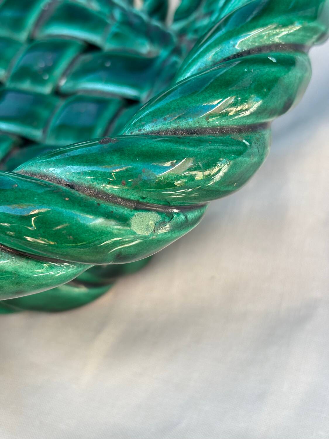 Green woven ceramic basket