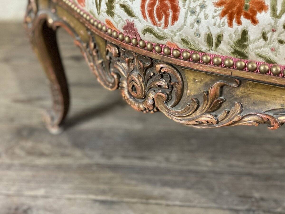 Regency style armchair in gilded wood