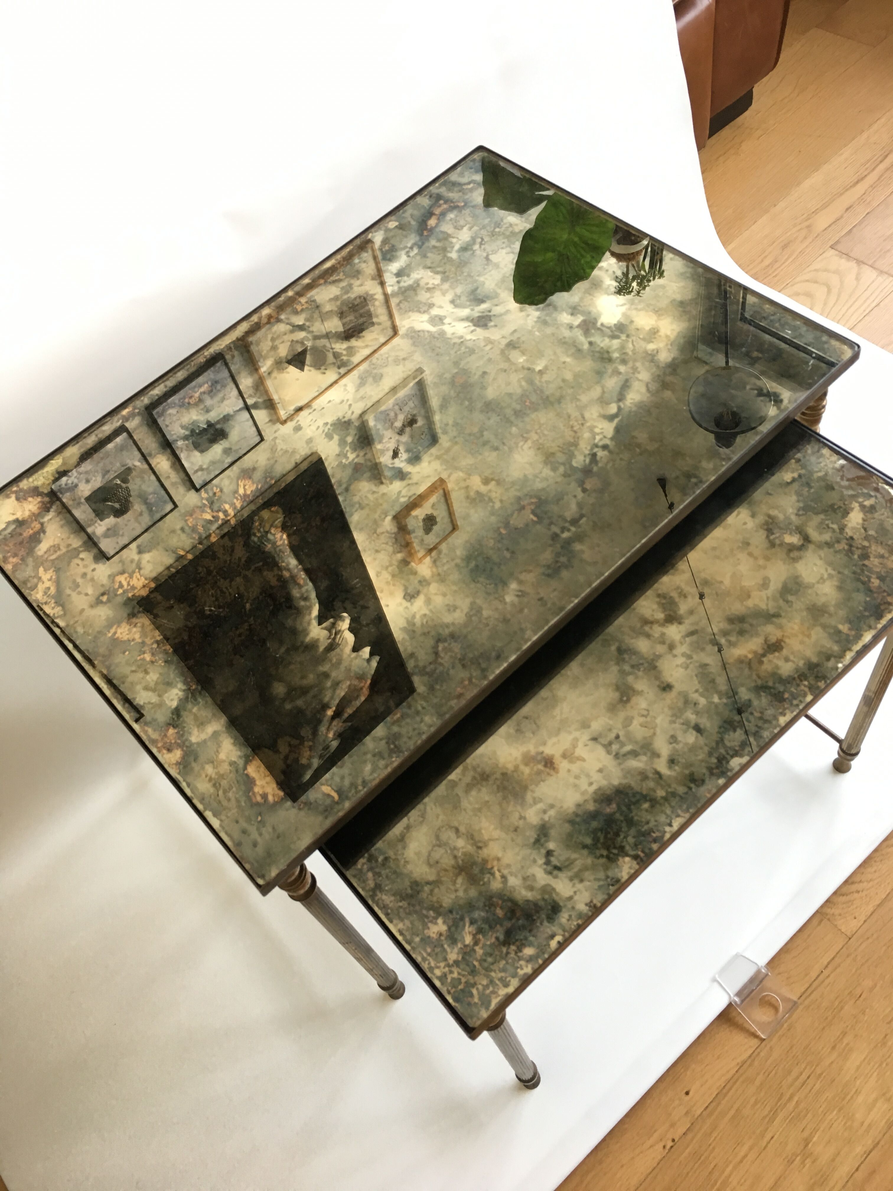 Brass and glass mirrored nesting tables