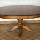 Louis Philippe solid cherry table with 2 extensions.