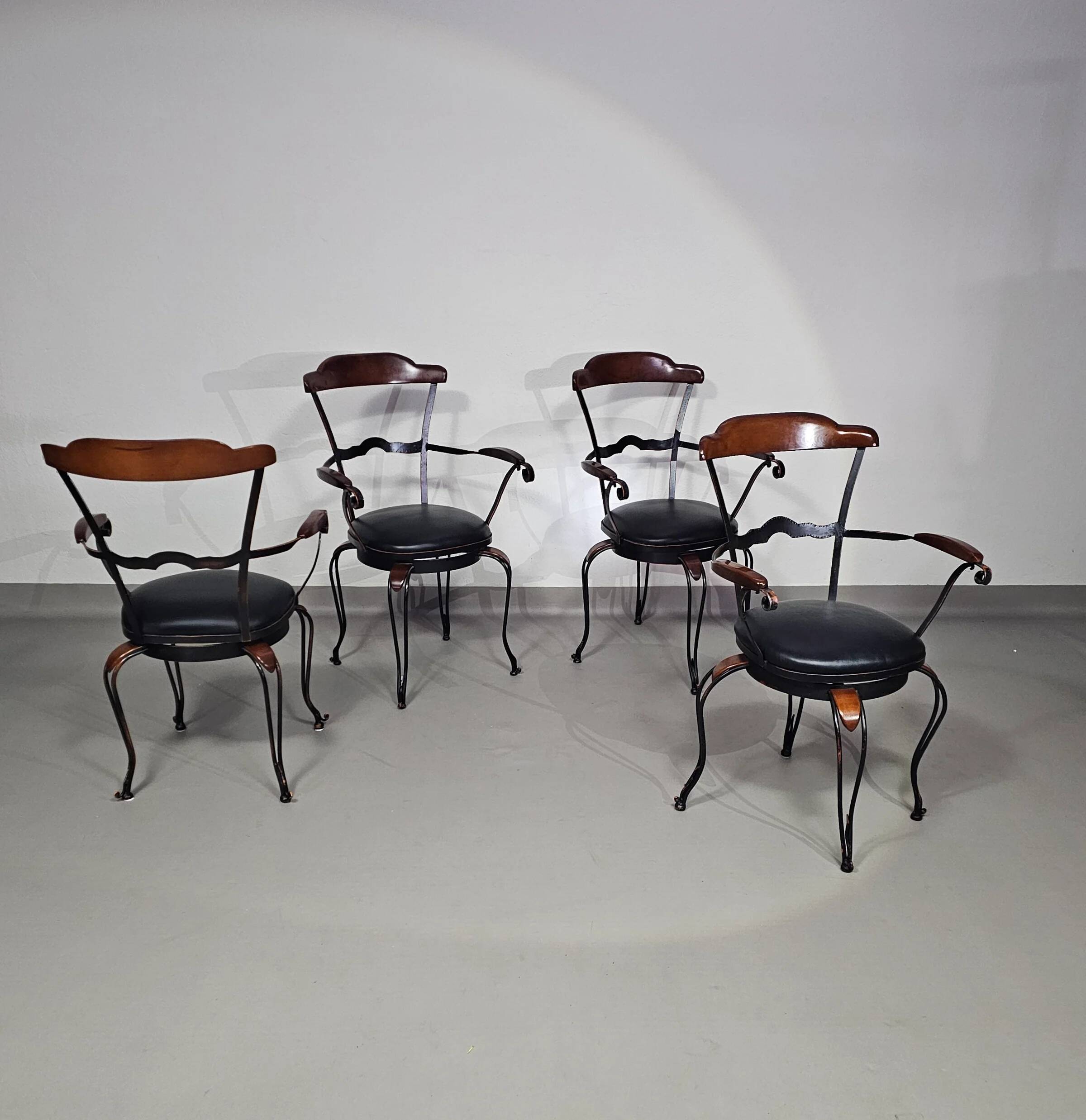 Italian postmodern turnable wrought iron dining chairs with leather seats