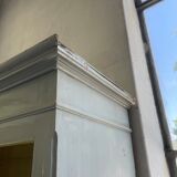 Blue patinated cap cabinet