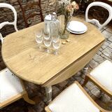 restored raw oak round table from yesteryear