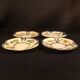4 Quimper earthenware saucers or plates