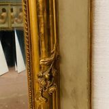 Miroir de style Louis XV en bois et stuc doré XX siècle