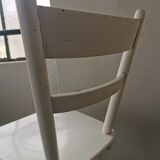 Set of 6 mismatched white chairs