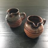 Pair of sandstone pitchers