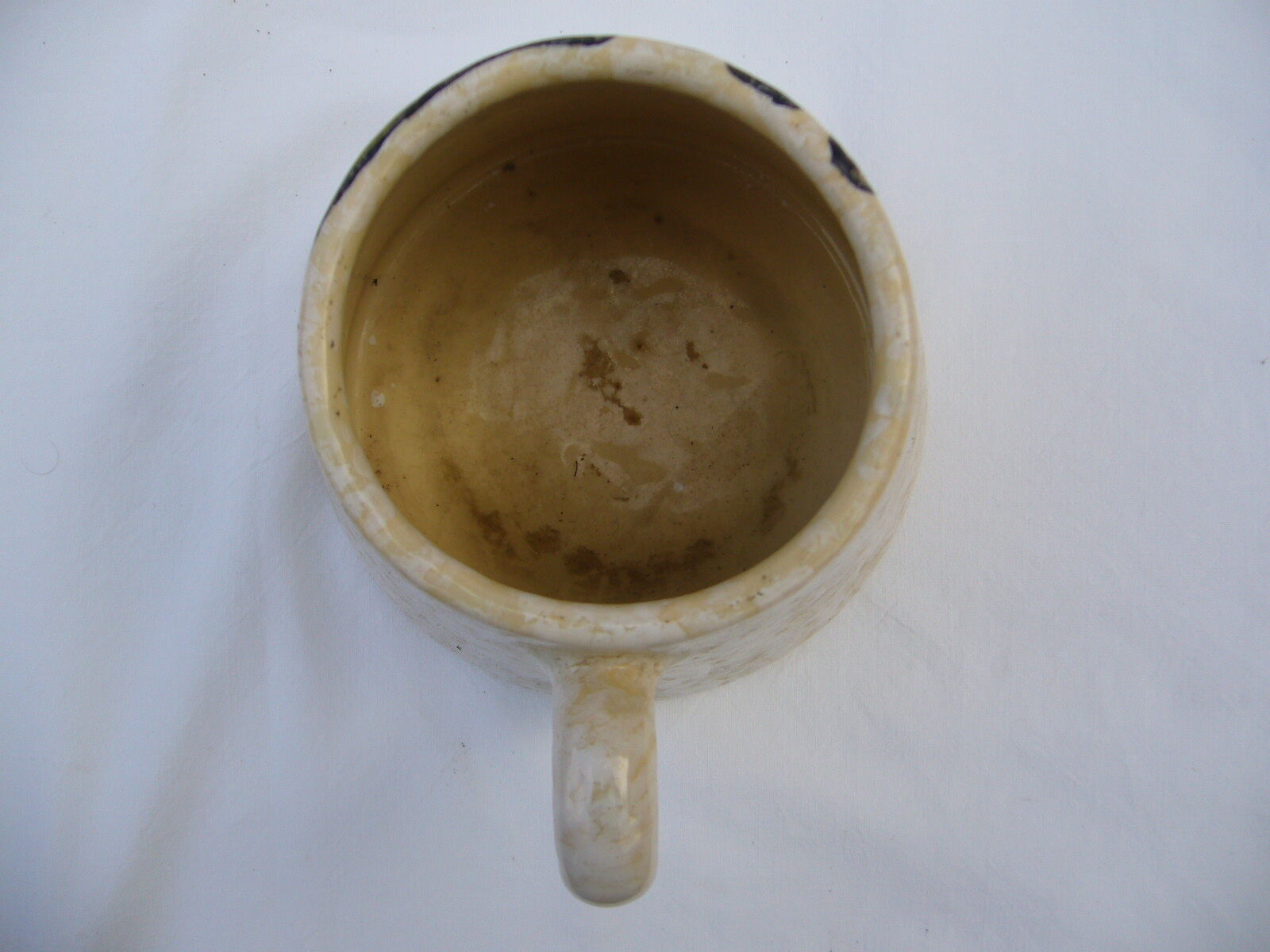 Vintage ceramic pitcher with rooster decoration