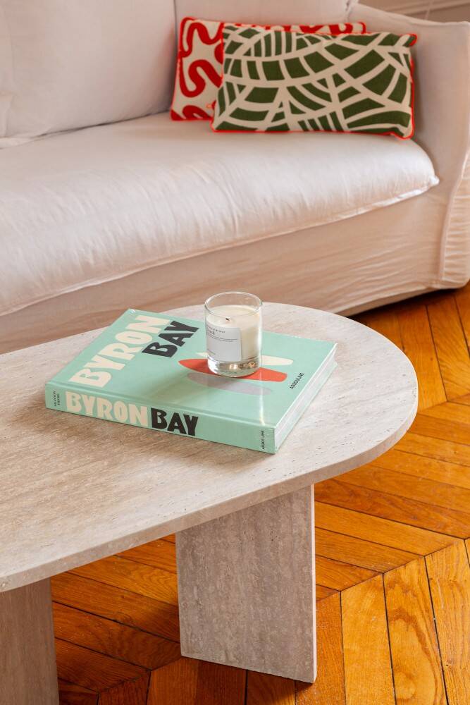 Oval coffee table in travertine