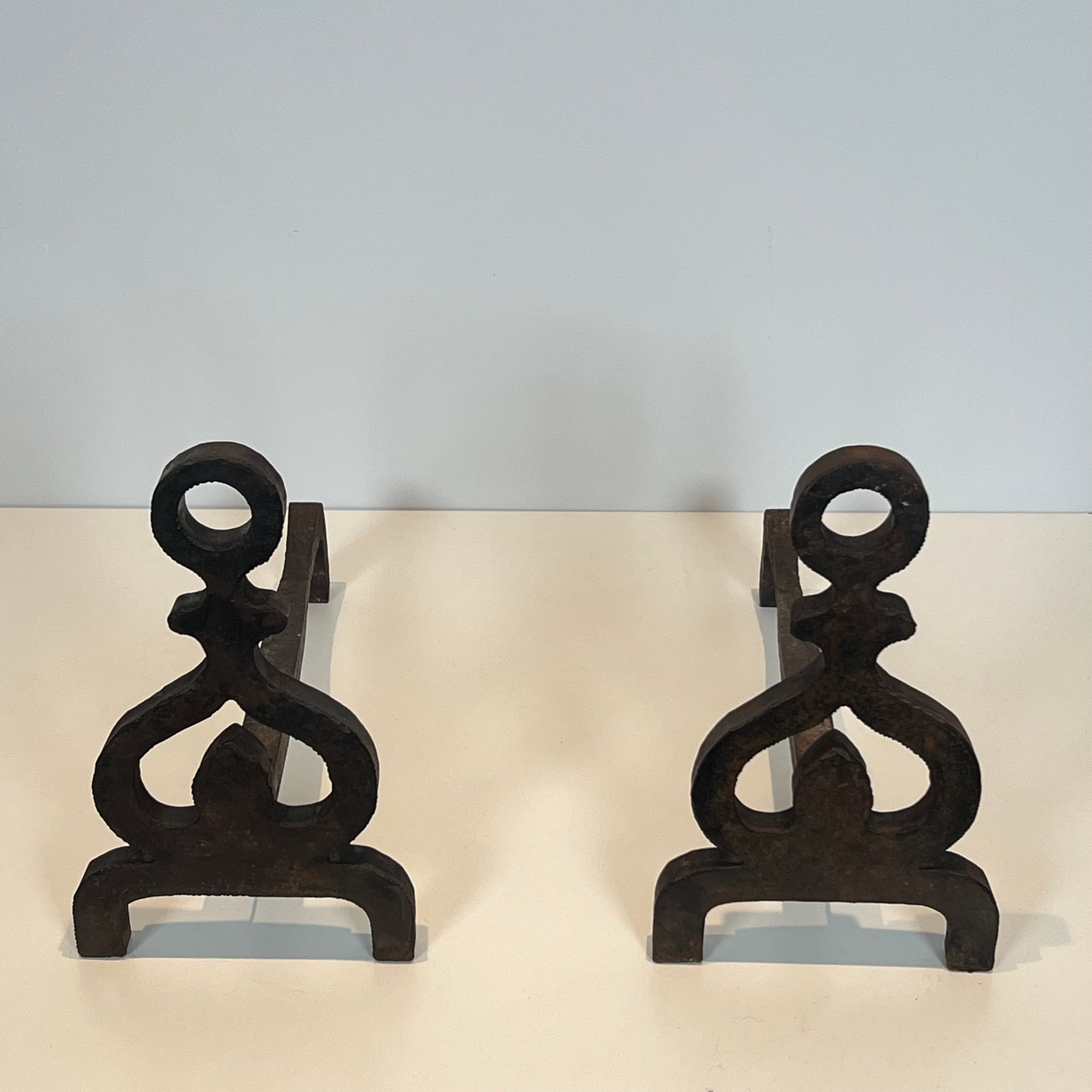 Pair of modernist wrought iron fire dogs.