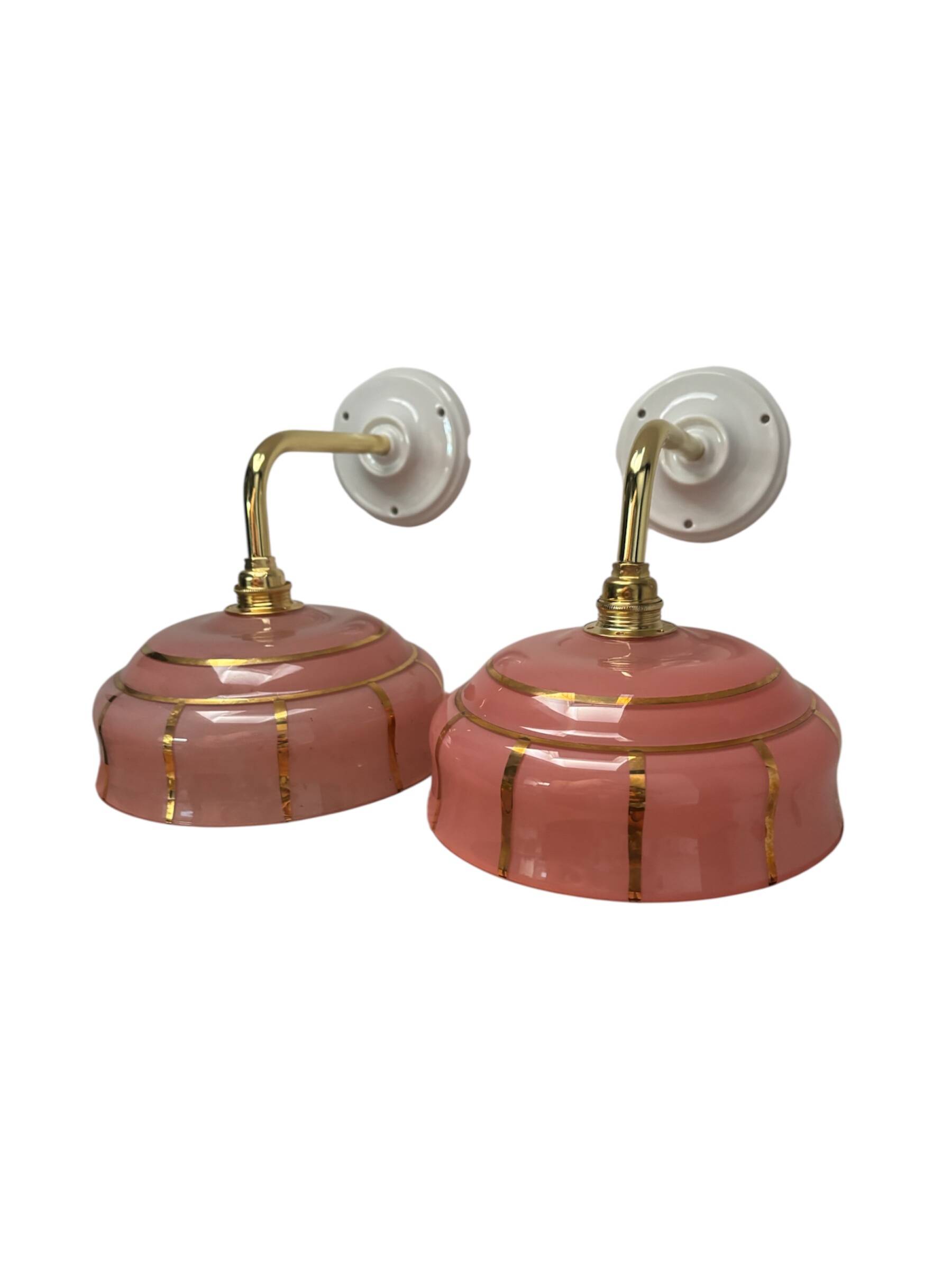 Pair of white ceramic wall lights with pink glass