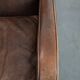 Elegant set of two sheepskin leather armchairs with beautiful round shapes